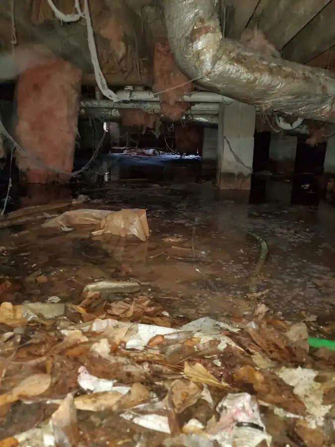 Crawl space flood assessment for Commercial Water Damage Restoration in Maplewood